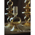 Candelador de velas de vidrio acanalado largo y vástago